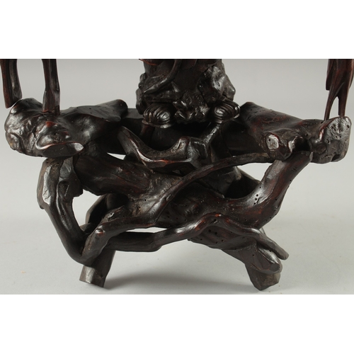 95 - A CHINESE SECTIONAL ROOT WOOD CARVING OF SHOU LAO, 41cm high overall.