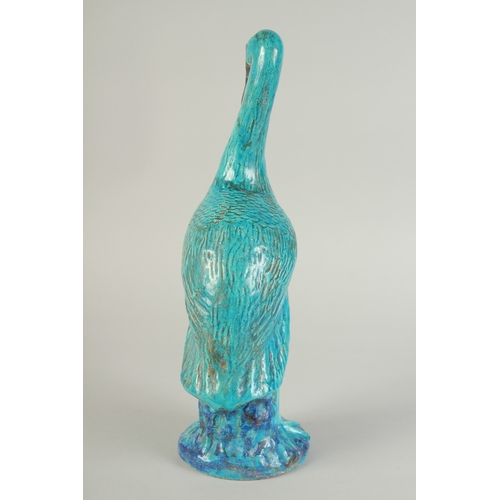 96 - A LARGE CHINESE TURQUOISE / BLUE GLAZED POTTERY CRANE, 39.5cm high.