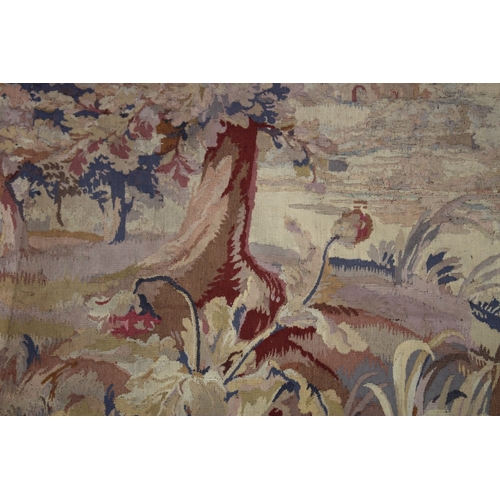 1001 - A GOOD 19TH CENTURY TAPESTRY WALL HANGING depicting buildings on an island with lake and woodland se... 