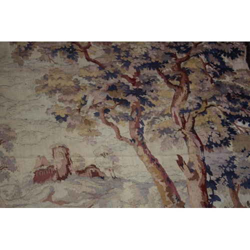 1001 - A GOOD 19TH CENTURY TAPESTRY WALL HANGING depicting buildings on an island with lake and woodland se... 