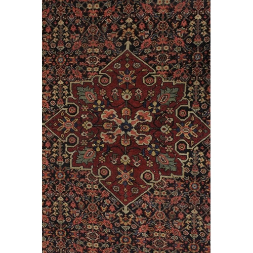 1004 - A GOOD PERSIAN PART SILK RUG blue and red ground with stylised floral design. 6ft 11ins x 4ft 4ins.... 