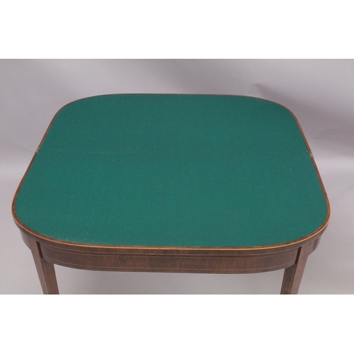 1012 - A GEORGIAN MAHOGANY CARD TABLE with folding flap, green baize cover, supported on tapering legs. 3ft... 