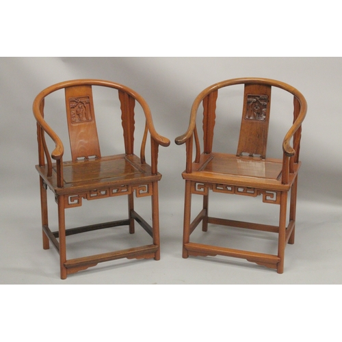 1013 - A GOOD PAIR OF CHINESE REDWOOD HOOP BACK CHAIRS with carved splats and solid seat.