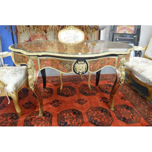 1017 - A GOOD BOULLE AND ORMOLU MOUNTED SINGLE DRAWER CENTRE TABLE of serpentine outline on cabriole legs. ... 