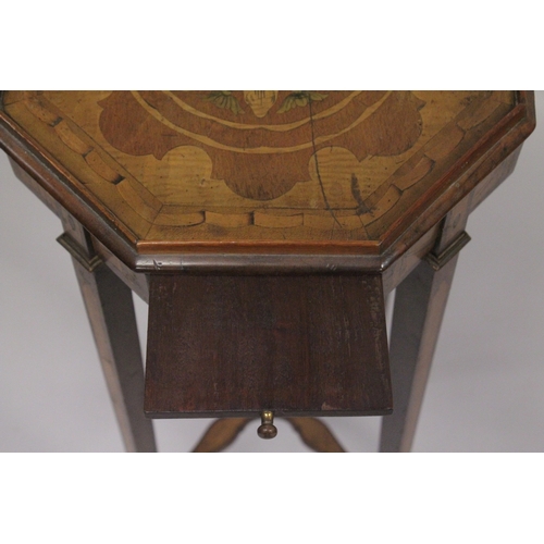 1020 - A GEORGIAN MAHOGANY INLAID OCTAGONAL TOP URN STAND with brushing slide on tapering legs with cross s... 