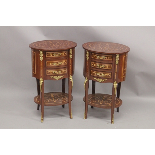 1033 - A GOOD PAIR OF LOUIS XVITH DESIGN OVAL BEDSIDE TABLES fitted with three drawers, gilt mounts, curvin... 