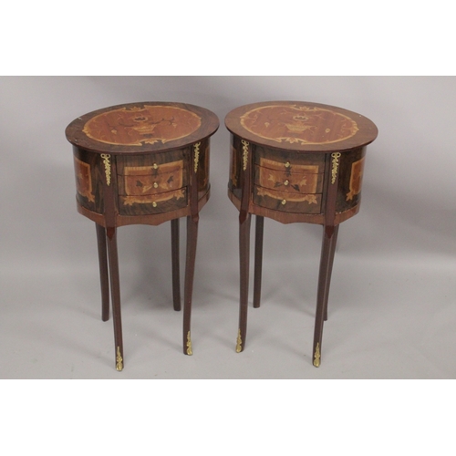 1038 - A GOOD PAIR OF LOUIS XVITH DESIGN OVAL BEDSIDE CABINETS fitted with three drawers with curving legs ... 