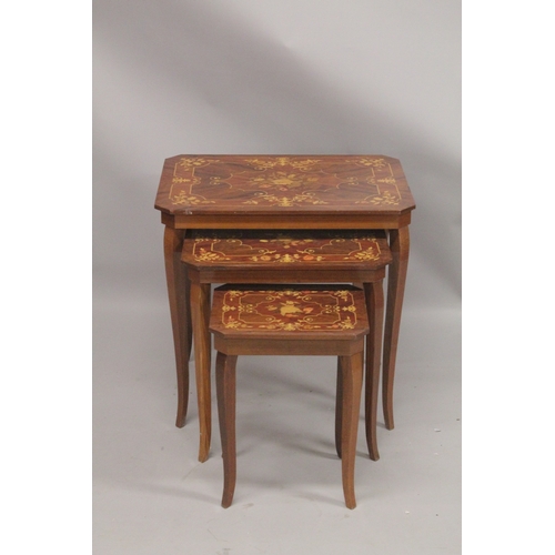 1042 - A NEST OF THREE LOUIS XVITH DESIGN MARQUETRY  INLAID TABLES on curving legs. Large table: 2ft 1ins l... 