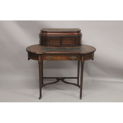 1047 - A LADIES VICTORIAN ROSEWOOD INLAID WRITING DESK with brass galley, a pair of panel doors, leather wr... 