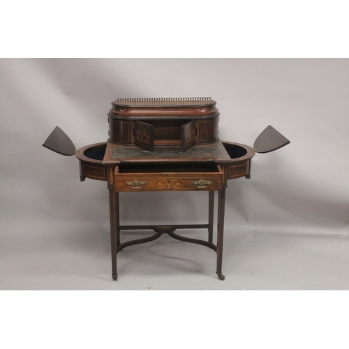 1047 - A LADIES VICTORIAN ROSEWOOD INLAID WRITING DESK with brass galley, a pair of panel doors, leather wr... 