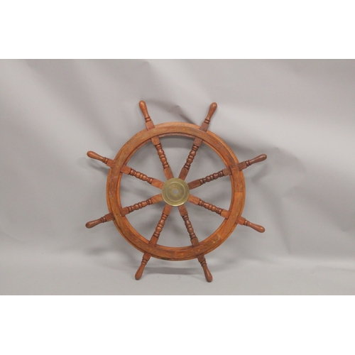 1049 - A WOODEN SHIP'S WHEEL 3ft diameter.