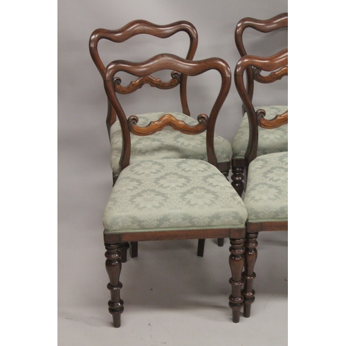 1060 - A GOOD SET OF  SIX VICTORIAN ROSEWOOD DINING CHAIRS with padded seats and turned legs.