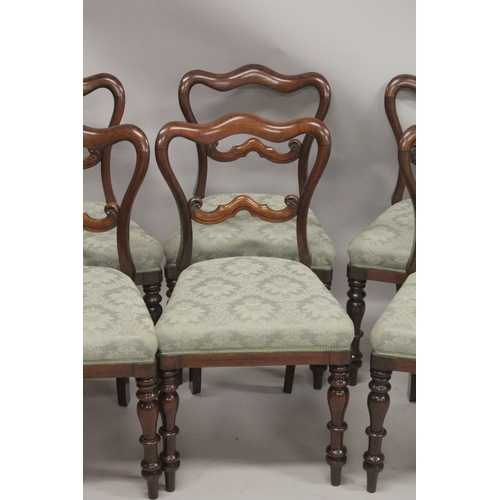 1060 - A GOOD SET OF  SIX VICTORIAN ROSEWOOD DINING CHAIRS with padded seats and turned legs.