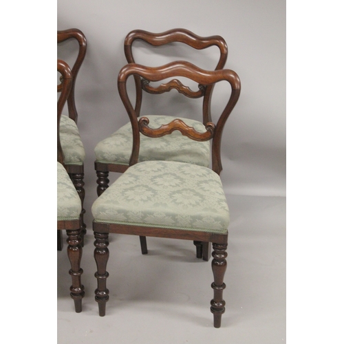 1060 - A GOOD SET OF  SIX VICTORIAN ROSEWOOD DINING CHAIRS with padded seats and turned legs.