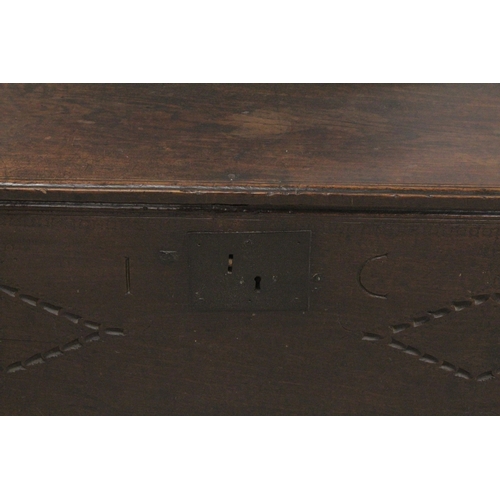 1061 - A 17TH - 18TH CENTURY PLAIN OAK LONG SWORD CHEST with rising top. 4ft 5ins long, 1ft 4ins deep, 1ft ... 