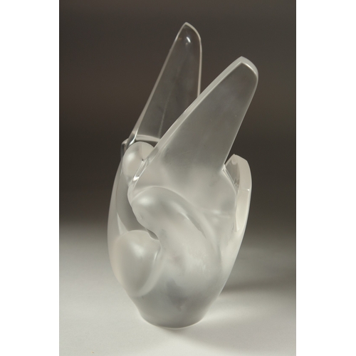 1072 - A FROSTED GLASS LALIQUE LOVE BIRD as a flower vase. Signed, Lalique, France.  8ins high (chipped).... 