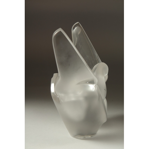 1072 - A FROSTED GLASS LALIQUE LOVE BIRD as a flower vase. Signed, Lalique, France.  8ins high (chipped).... 