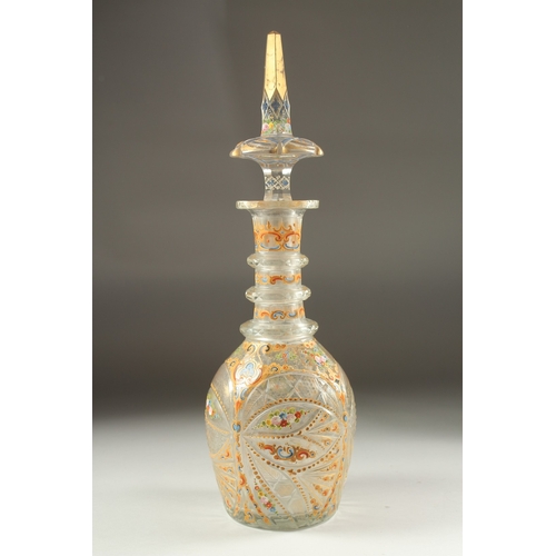 1078 - A VERY GOOD VENETIAN GLASS GILDED AND PAINTED LARGE DECANTER AND STOPPER with panels of flowers.  18... 