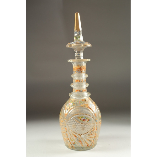 1078 - A VERY GOOD VENETIAN GLASS GILDED AND PAINTED LARGE DECANTER AND STOPPER with panels of flowers.  18... 