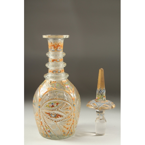 1078 - A VERY GOOD VENETIAN GLASS GILDED AND PAINTED LARGE DECANTER AND STOPPER with panels of flowers.  18... 