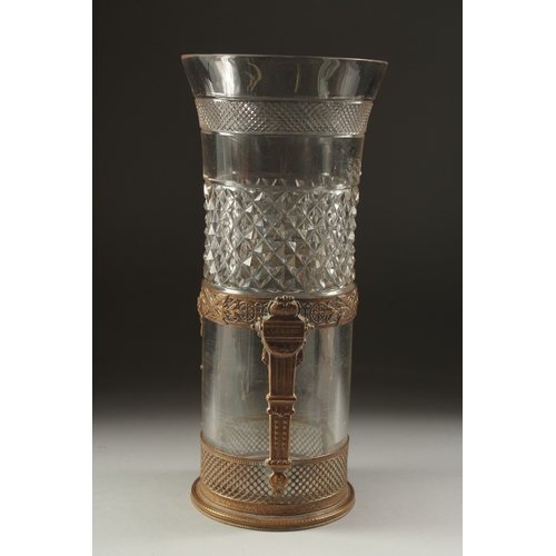 1082 - AN 19TH CENTURY FRENCH BRASS AND GLASS VASE. 9.5ins high.