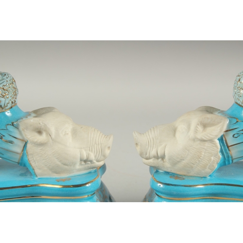 1109 - A PAIR OF SEVRES DESIGN BLUE PORCELAIN BOARS HEAD CORNUCOPIA VASES. 11ins high.