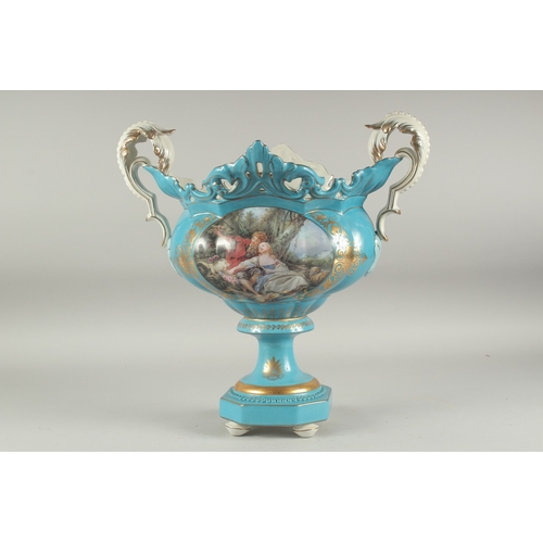 1110 - A SEVRES STYLE LIGHT BLUE TWO HANDLED PORCELAIN VASE with reverse panels of figures. 1ft 4ins high.... 