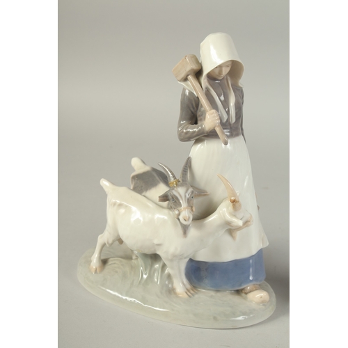 1131 - A COPENHAGEN PORCELAIN GROUP, young girl with two goats. No. 694, and a GIRL WITH A GOOSE, No. 528, ... 