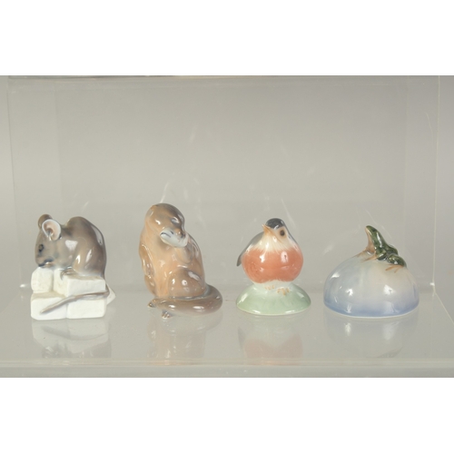 1133 - SEVEN SMALL COPENHAGEN PORCELAIN FIGURES: TWO OWLS, No. 834, SALMON, No. 2414, CARP No. 2553, OTTER,... 