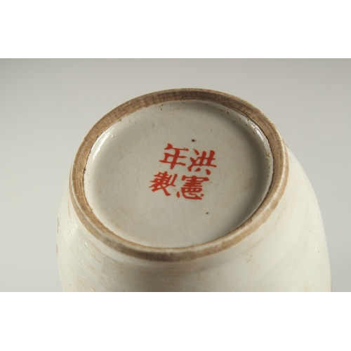 1159 - A CHINESE REBUBLIC PORCELAIN VASE with blossom and birds. 11ins high.