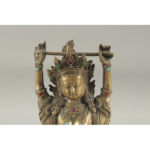 1162 - A CHINESE BRONZE TARA FIGURE. 9.5ins high.