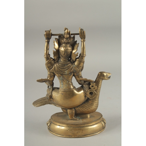 1162 - A CHINESE BRONZE TARA FIGURE. 9.5ins high.