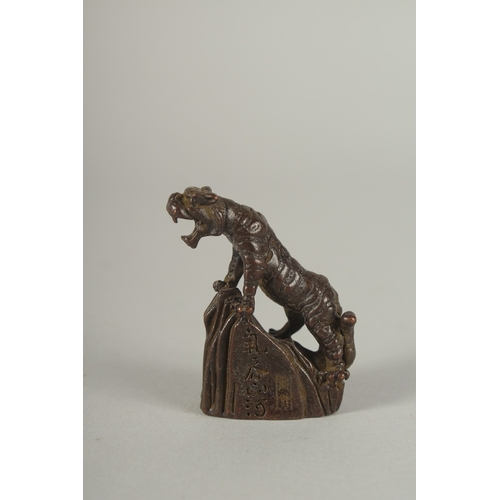 1168 - A JAPANESE BRONZE TIGER.  2ins