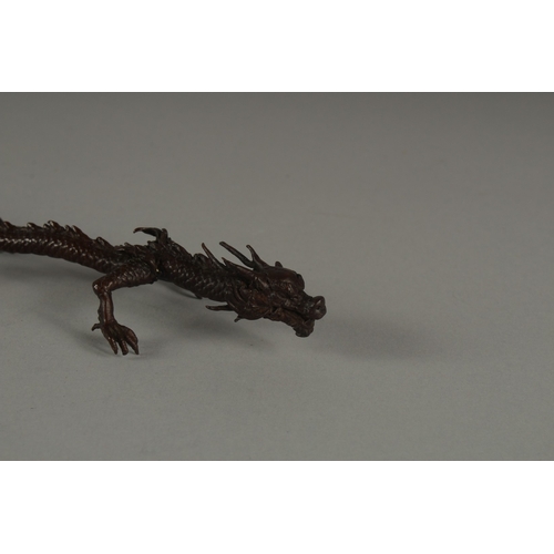 1173 - A LARGE BRONZE DRAGON.  6ins long.