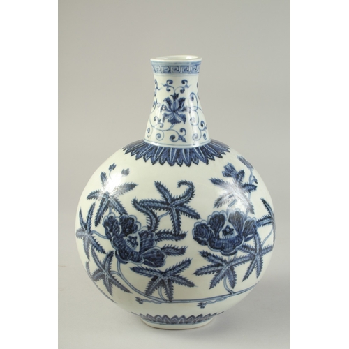 1186 - A  CHINESE BLUE AND WHITE PORCELAIN  MOON FLASK with floral decoration.  31cm high.