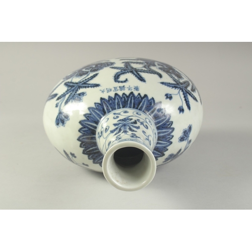 1186 - A  CHINESE BLUE AND WHITE PORCELAIN  MOON FLASK with floral decoration.  31cm high.