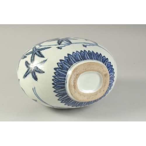 1186 - A  CHINESE BLUE AND WHITE PORCELAIN  MOON FLASK with floral decoration.  31cm high.