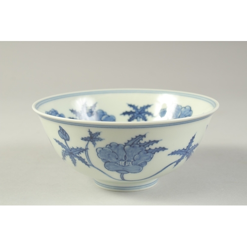 1187 - A  CHINESE BLUE AND WHITE PORCELAIN BOWL painted with flower heads.  15cm diameter.