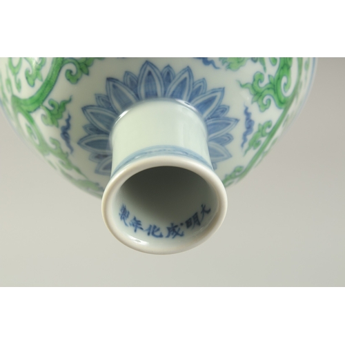 1188 - A CHINESE FAMILLE VERTE PORCELAIN STEM CUP with kui dragons. 15.5cm diameter.