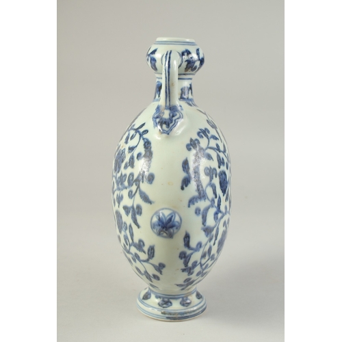 1192 - A CHINESE BLUE AND WHITE LOTUS MOON FLASK.  28cm high.