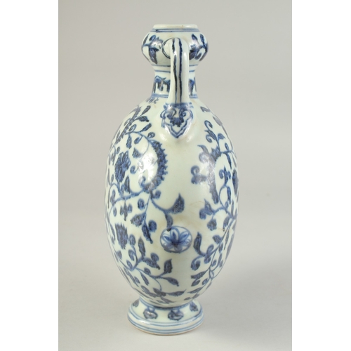 1192 - A CHINESE BLUE AND WHITE LOTUS MOON FLASK.  28cm high.