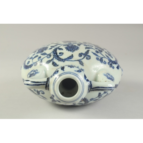 1192 - A CHINESE BLUE AND WHITE LOTUS MOON FLASK.  28cm high.