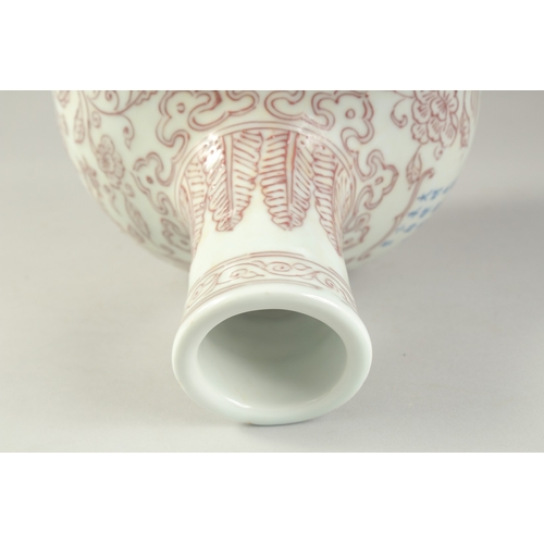 1194 - A CHINESE UNDERGLAZE RED VASE with phoenix and flora.  27ins high.