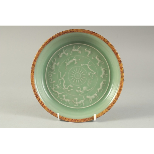 1195 - A CHINESE LONGGUN WARE DISH.  21cm diameter.