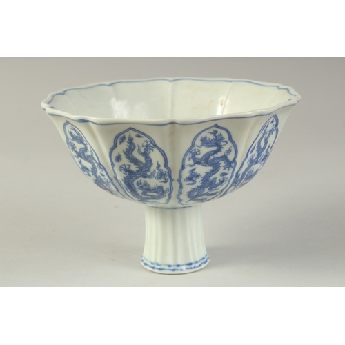 1196 - A CHINESE BLUE AND WHITE PETAL FORM STEM CUP.  17cm wide.