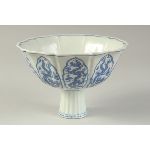 1196 - A CHINESE BLUE AND WHITE PETAL FORM STEM CUP.  17cm wide.