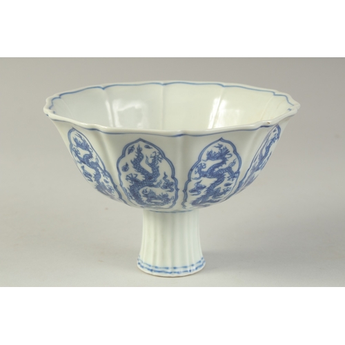 1196 - A CHINESE BLUE AND WHITE PETAL FORM STEM CUP.  17cm wide.