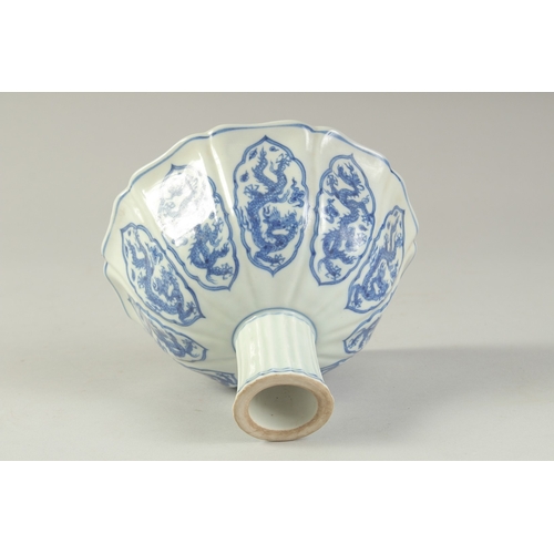 1196 - A CHINESE BLUE AND WHITE PETAL FORM STEM CUP.  17cm wide.