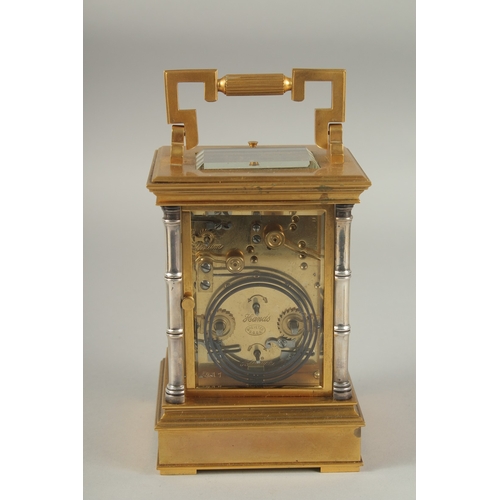 1202 - A GOOD 19TH CENTURY FRENCH BRASS REPEATER CARRIAGE CLOCK with cream dial and silvered bamboo type su... 