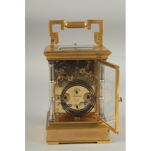 1202 - A GOOD 19TH CENTURY FRENCH BRASS REPEATER CARRIAGE CLOCK with cream dial and silvered bamboo type su... 